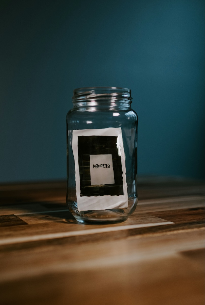 A glass jar labeled memories